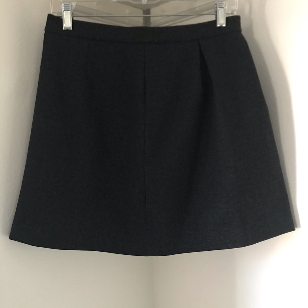 Dark gray pleated Madewell mini skirt with pockets
